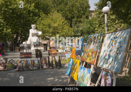 Armenia, Yerevan, Freedom Square, Swan Lake, Armenian art vendors with Martiros Sarian statue Stock Photo