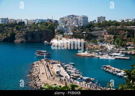 Antalya, Turkey - April 22, 2018: Small beach from top and panoramic shot of the rocks and buildings. Stock Photo