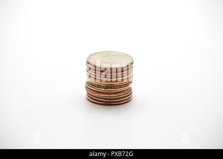 Stack of coins quarters money change cash savings market investment payment loan deposit finance salary wealth Stock Photo