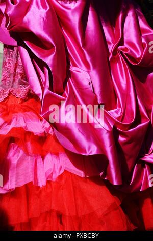 drape of crimson fabric and lace, background Stock Photo