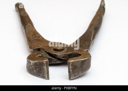 Tools for pulling nails - old metal pliers. Stock Photo