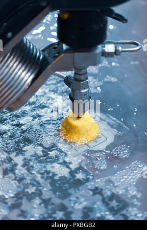 CNC water jet cutting machine modern industrial technology. Stock Photo