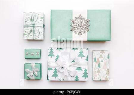 Beautiful Nordic Christmas Gifts Isolated On White Background Turquoise  Colored Wrapped Xmas Boxes Gift Wrapping Concept Stock Photo - Download  Image Now - iStock