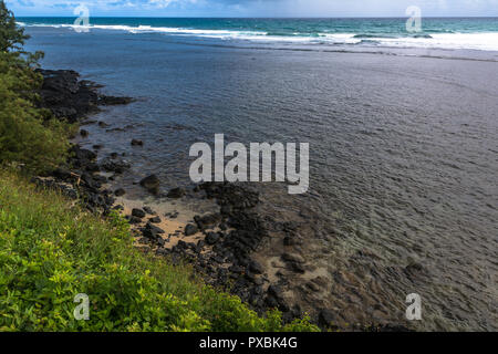 View of the coast and the ocean along Anini Beach Park, Kauai, Hawaii Stock Photo