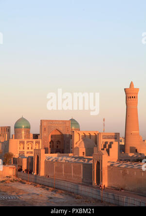 Uzbekistan; Bukhara; Mir-i-Arab Madrasa, Kalon Minaret, skyline, Stock Photo