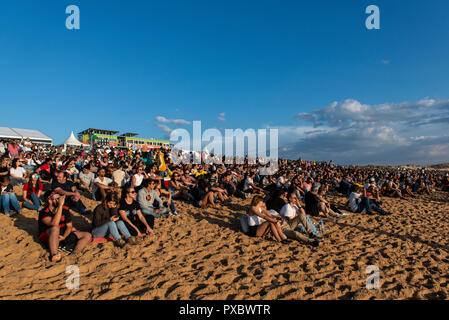 Crowd is seen watching the Portuguese stage of the World Surf League, MEO Rio Curl Pro, held in Peniche.  Brazilian surfer Italo Ferreira won the Portuguese stage of the World Surf League, MEO Rio Curl Pro, held in Peniche. Ferreira defeated frenchman Joan Duru in the final after beating compatriot Gabriel Medina in the semi-finals. Now all the attention goes to Havaii, the final step that will decide the next world surfing champion. Stock Photo