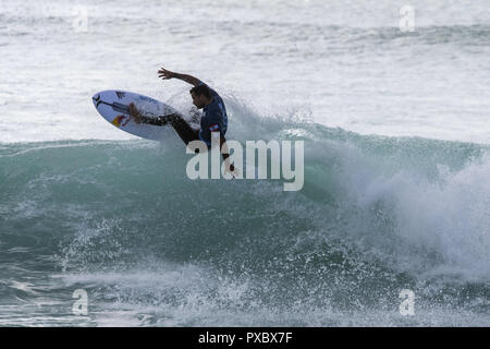 Peniche, Portugal. 20th Oct, 2018. Michel Bourez (PYF) is seen riding a wave at Supertubos Beach, Peniche.Brazilian surfer Italo Ferreira won the Portuguese stage of the World Surf League, MEO Rio Curl Pro, held in Peniche. Ferreira defeated frenchman Joan Duru in the final after beating compatriot Gabriel Medina in the semi-finals. Now all the attention goes to Havaii, the final step that will decide the next world surfing champion. Credit: Hugo Amaral/SOPA Images/ZUMA Wire/Alamy Live News Stock Photo