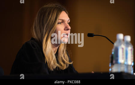 Simona Halep of Romania talks to the media at the 2019 Porsche Tennis