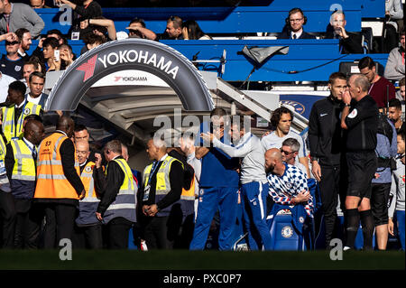 London, UK. 20th Oct, 2018. Gianfranco Zola assistant manager of Chelsea talks to Maurizio Sarri manager of Chelsea after the touchline bust up between Jose Mourinho and Marco Ianni assistant coach of Chelsea during the Premier League match between Chelsea and Manchester United at Stamford Bridge, London, England on 20 October 2018. Photo by Liam McAvoy. Credit: UK Sports Pics Ltd/Alamy Live News Stock Photo
