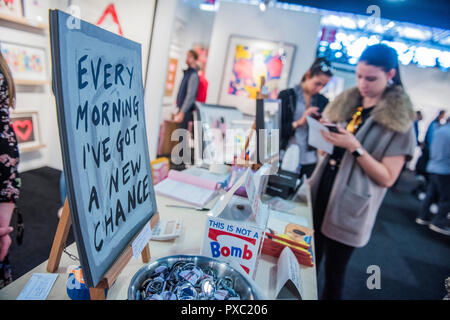 London, UK. 21st Oct, 2018. Visitors enjoythe final day - The Affordable Art Fair in Battersea Park and runs until 21 Oct. The fair offers visitors a chance to purchase work from over 110 galleries at prices between £100 and £6,000 Credit: Guy Bell/Alamy Live News Stock Photo