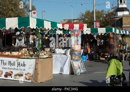 Woolwich, London, UK. 21st October 2018. Woolwich Market opens in Beresford Square from today, each Sunday of the year from 9am to 5pm, bringing about 40 independent traders of mixed vintage, crafts, jewellery, gifts, arts, hidden gems, street food and live music to the centre of the town.  Credit: Joe Kuis / 17�Թ����� Live News Stock Photo