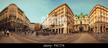 Peterskirche (Saint Peter Church) is a Baroque Roman Catholic Parish Church on Petersplatz. View from Graben Street, Vienna City. Stock Photo