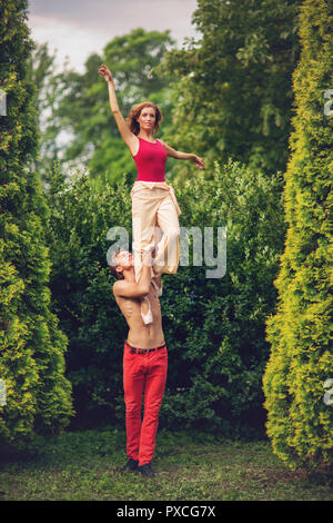 beautiful modern ballet couple dancing in summer outdoors Stock Photo