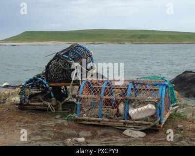 A lobster trap or lobster pots are seen on the east coast of Ireland Stock Photo