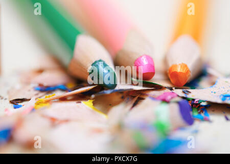 Closeup on sharpened colored pencils with shavings Stock Photo