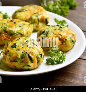 Vegetable cutlet from carrot, zucchini, potato. Concept of healthy diet food. Close up view Stock Photo