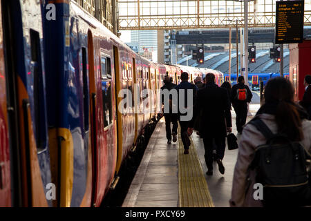 Commuters boarding a South Western train at Waterloo Station Stock Photo