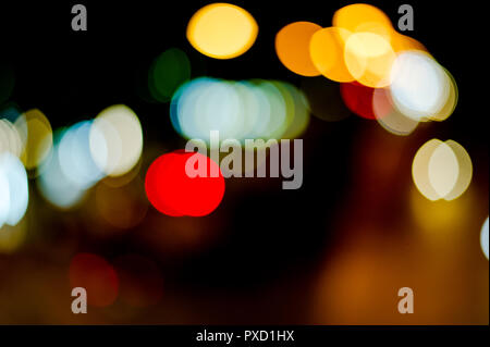 Beautiful blooms, backgrounds, bokeh, wallpapers, street lights, cars running back and forth. Cold and beautiful fire. Can be used to work. Celebrate  Stock Photo