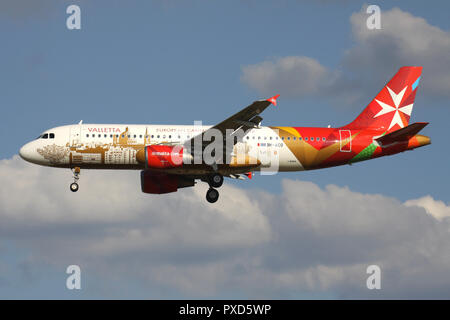 Air Malta Airbus A320-200 in special Valetta livery with registration 9H-AEO on short final for runway 01 of Brussels Airport. Stock Photo