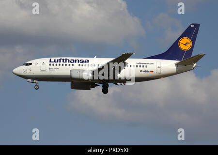 German Lufthansa Boeing 737-500 (old livery) with registration D-ABIM on short final for runway 01 of Brussels Airport. Stock Photo