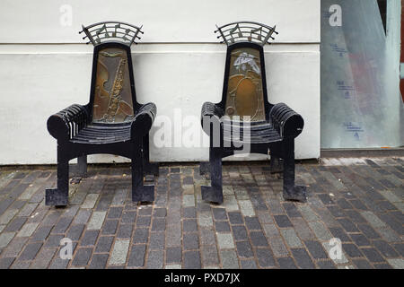 Two musical chairs in a hidden road near Matthew Street, Liverpool Stock Photo