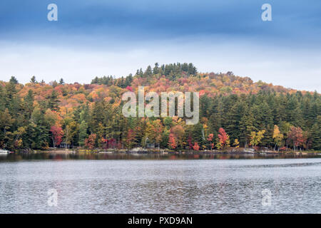 A view of the brilliant and eclectic colors that take over the entire Adirondacks region in New York state of USA during the peak fall season