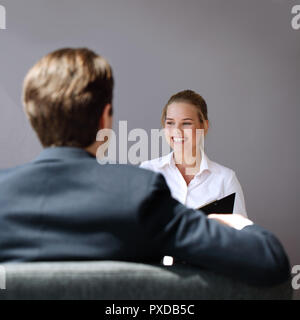 Job businss interview - businessman listen to candidate answers Stock Photo