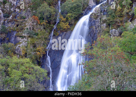 Aber Falls is in the Snowdonia National Park where the Afon Goch plunges from the Carneddau Range close to the village of Abergwyngregyn. Stock Photo