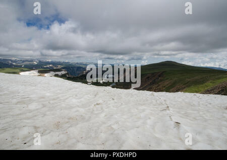 Lots of snow remains along the Beartooth Pass Highway in Montana in July summer