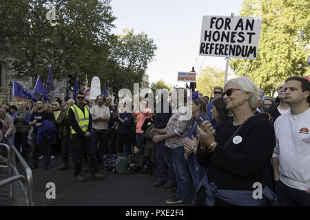 London, Greater London, UK. 20th Oct, 2018. An anti-Brexit protester is seen holding a placard during the march.A huge demonstration organised by the People's vote campaign gathered at Park Lane to march to the Parliament Square to protest against the Tory government's Brexit negotiations and demanding for a second vote on the final Brexit deal. Credit: Andres Pantoja/SOPA Images/ZUMA Wire/Alamy Live News