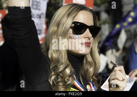 London, Greater London, UK. 20th Oct, 2018. Anti-Brexit protester seen with her face painted during the march.A huge demonstration organised by the People's vote campaign gathered at Park Lane to march to the Parliament Square to protest against the Tory government's Brexit negotiations and demanding for a second vote on the final Brexit deal. Credit: Andres Pantoja/SOPA Images/ZUMA Wire/Alamy Live News