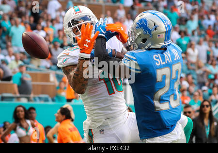 Miami Gardens, Florida, USA. 21st Oct, 2018. Miami Dolphins wide receiver Kenny Stills (10) looses the ball to Detroit Lions cornerback Darius Slay (23) during a NFL football game between the Detroit Lions and the Miami Dolphins at the Hard Rock Stadium in Miami Gardens, Florida. Credit: Mario Houben/ZUMA Wire/Alamy Live News Stock Photo