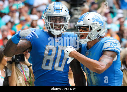 Miami Gardens, Florida, USA. 21st Oct, 2018. Detroit Lions tight end Michael Roberts (80) is greeted by Detroit Lions wide receiver Marvin Jones (11) after scoring a touchdown in the third quarter during a NFL football game between the Detroit Lions and the Miami Dolphins at the Hard Rock Stadium in Miami Gardens, Florida. Credit: Mario Houben/ZUMA Wire/Alamy Live News Stock Photo