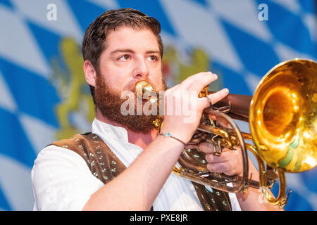 Pilsen, Czech Republic. 20th Oct, 2018. The sixth Treffpunkt Czech-Bavarian festival in Plzen, Czech Republic, October 20, 2018. The programme present Czech and Bavarian music, folklore, dance, exhibitions, authors' readings, films, lectures as well as Czech and Bavarian food and drinks. Treffpunkt has launched the tradition of Plzen-Regensburg meetings. During the festival, the DEPO2015 former bus depot turned into a typical Bavarian Biergarten similar to that during the Oktoberfest beer event in Munich. Credit: Miroslav Chaloupka/CTK Photo/Alamy Live News Stock Photo