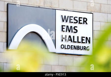 Oldenburg, Germany. 22nd Oct, 2018. A sign with the logo hangs on a wall of the Weser-Ems-Hallen, into which the district court has to evade the new trial against the patient murderer Niels Högel due to lack of space. 120 joint plaintiffs, numerous spectators and journalists are expected at the trial of what is probably the largest murder series in the German post-war period from 30 October 2018. Credit: Hauke-Christian Dittrich/dpa/Alamy Live News Stock Photo