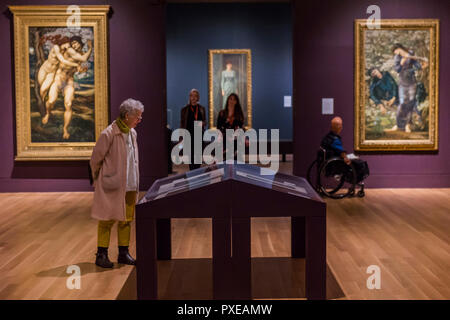 London, UK. 22nd Oct, 2018. Phyllis and Demaphoon and the Beguiling of Merlin - A retrospective of Pre-Raphaelite painter Edward Burne-Jones at the Tate Britain. Renowned for otherworldly depictions of beauty inspired by myth, legend and the Bible, Burne-Jones was a pioneer of the symbolist movement and the only Pre-Raphaelite to achieve world-wide recognition in his lifetime. The exhibition brings together 150 works across painting, stained glass and tapestry. It runs from 24 Oct 18 - 24 Feb 19. Credit: Guy Bell/Alamy Live News Stock Photo