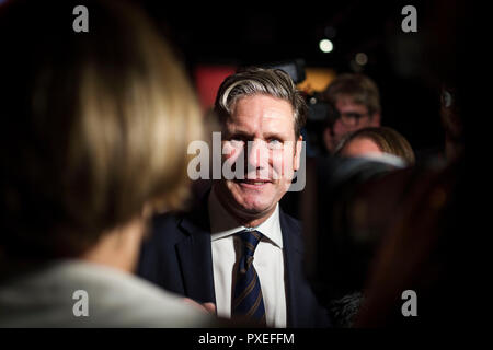 © Chris Bull. 26/9/18   LIVERPOOL   , UK.   The Labour Party Conference today (WEDNESDAY 26th Septeber 2018).  Shadow Secretary of State for Exiting the European Union Keir Starmer MP is questioned by journalists as he leaves the conference hall follwing Leader of the Labour Party Jeremy Corbyn's speech. There have been calls for him to clarify Labour's Brexit policy after his speech contradicted some of what John McDonnell has said.    Photo credit: CHRIS BULL Stock Photo