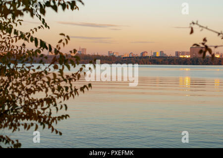 cityscape at dusk, sunset over the river Stock Photo