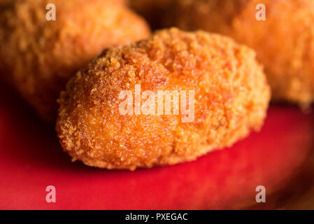 Freshly cooked breaded meat cutlets on plate Stock Photo