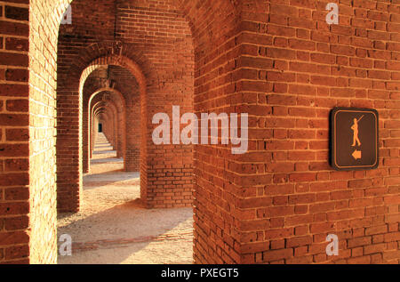 A sign posted inside Fort Jefferson provides orientation to visitors enjoying self-guided tours, Dry Tortugas National Park in the western most Keys Stock Photo