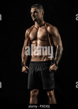 Toned and muscular male who regularly weight trains at the gym Stock Photo
