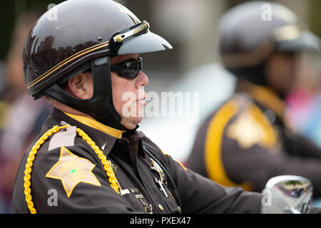 Indianapolis, Indiana, USA - September 22, 2018: The Circle City Classic Parade, Close up of police officer riding motorcycles at the parade Stock Photo