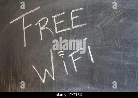 Free wifi written on chalkboard Stock Photo
