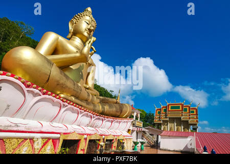 The large Buddha of Wat Khao Rang in Phuket Town, Phuket, Thailand, at the foot of Rang Hill (Khao Rang), his hand in the Vitarka Mudra (position) Stock Photo