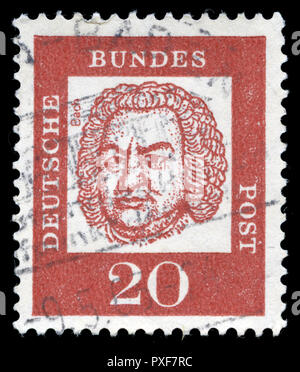 Deutsche Bundespost 20 red stamp - Theodor Heuss 1959 Stock Photo ...