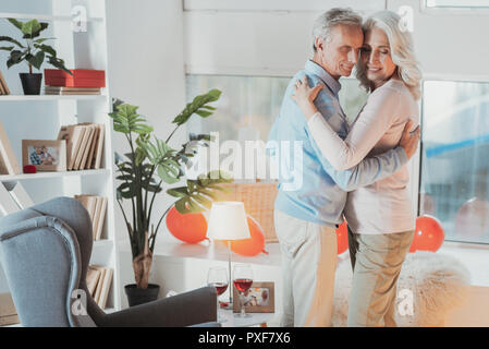 Happy senior spouses spending romantic weekend Stock Photo