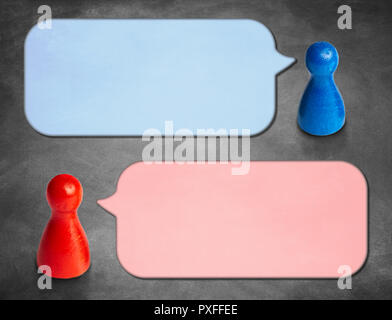 Game figures with angled speech bubbles with blackboard backgrou Stock Photo