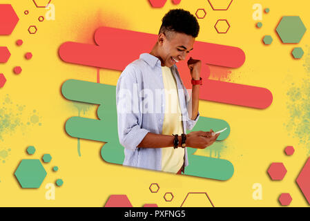 Happy birthday boy feeling pleased and cheerful reading congratulation letters Stock Photo