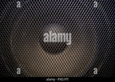 Musical powerful speaker with a protective grill close-up. Stock Photo