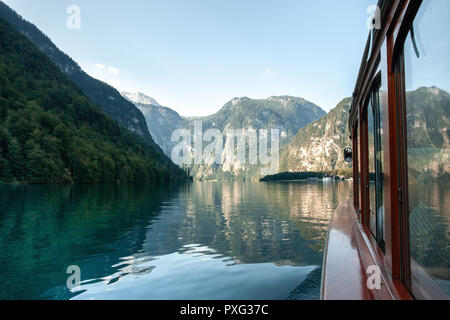 Stunning deep green waters of Konigssee, known as Germanys deepest and cleanest lake, located in the extreme southeast Berchtesgadener Land district of Bavaria, near the Austrian border. View from boat Stock Photo